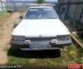 Белый Тойота Карина, объемом двигателя 1.5 л и пробегом 300 тыс. км за 550 $, фото 1 на Automoto.ua