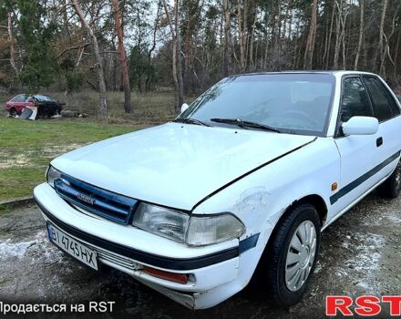 Белый Тойота Карина, объемом двигателя 2 л и пробегом 0 тыс. км за 800 $, фото 1 на Automoto.ua