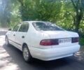 Белый Тойота Карина, объемом двигателя 2 л и пробегом 111 тыс. км за 2500 $, фото 4 на Automoto.ua