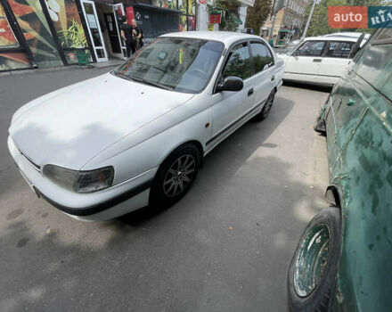 Белый Тойота Карина, объемом двигателя 1.6 л и пробегом 380 тыс. км за 4000 $, фото 1 на Automoto.ua