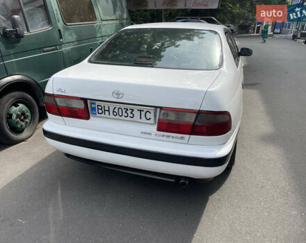 Белый Тойота Карина, объемом двигателя 1.6 л и пробегом 380 тыс. км за 4000 $, фото 3 на Automoto.ua