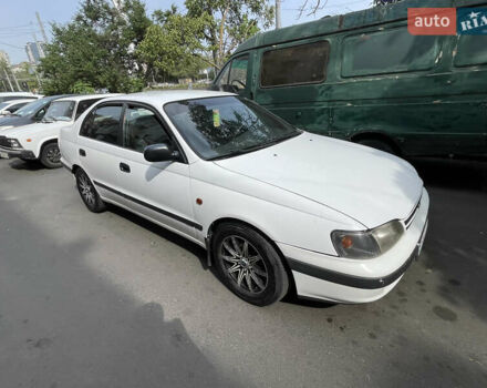 Белый Тойота Карина, объемом двигателя 1.6 л и пробегом 380 тыс. км за 4000 $, фото 2 на Automoto.ua
