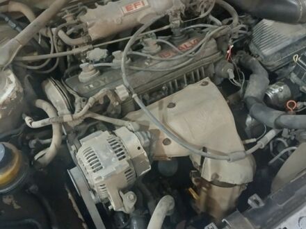 Белый Тойота Карина, объемом двигателя 1.8 л и пробегом 100 тыс. км за 750 $, фото 1 на Automoto.ua