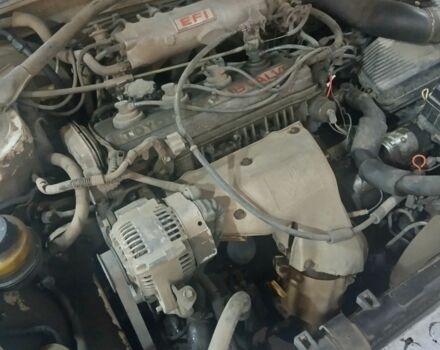 Белый Тойота Карина, объемом двигателя 1.8 л и пробегом 100 тыс. км за 750 $, фото 1 на Automoto.ua