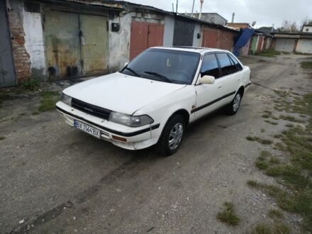 Белый Тойота Карина, объемом двигателя 2 л и пробегом 3 тыс. км за 710 $, фото 1 на Automoto.ua