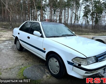 Белый Тойота Карина, объемом двигателя 2 л и пробегом 0 тыс. км за 800 $, фото 1 на Automoto.ua