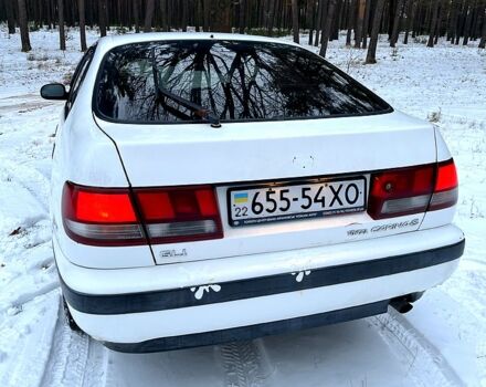 Белый Тойота Карина, объемом двигателя 1.6 л и пробегом 299 тыс. км за 1499 $, фото 1 на Automoto.ua