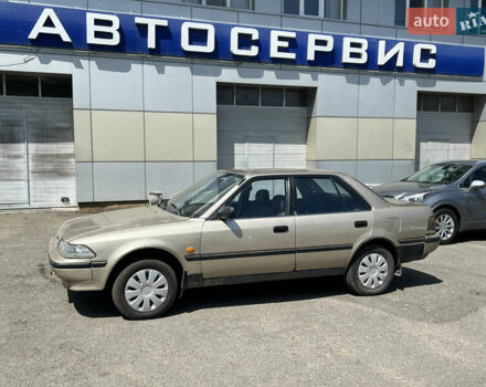 Бежевий Тойота Каріна, об'ємом двигуна 1.59 л та пробігом 396 тис. км за 1299 $, фото 4 на Automoto.ua