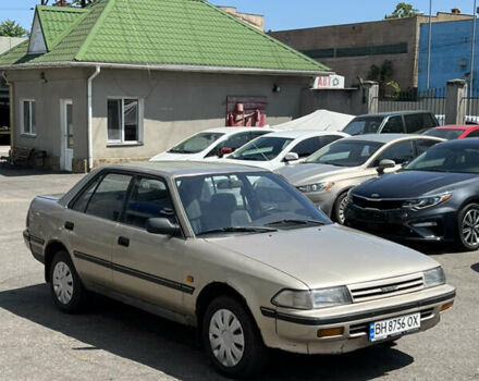 Бежевий Тойота Каріна, об'ємом двигуна 1.59 л та пробігом 396 тис. км за 1299 $, фото 1 на Automoto.ua