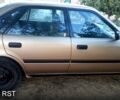 Бежевий Тойота Каріна, об'ємом двигуна 1.6 л та пробігом 515 тис. км за 2000 $, фото 1 на Automoto.ua
