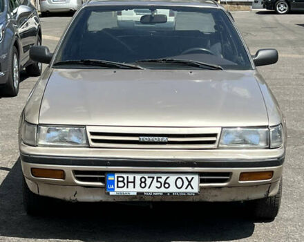 Бежевий Тойота Каріна, об'ємом двигуна 1.59 л та пробігом 396 тис. км за 1299 $, фото 1 на Automoto.ua