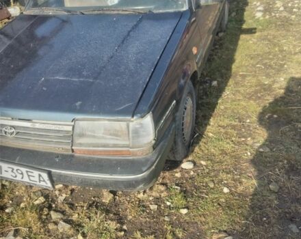 Черный Тойота Карина, объемом двигателя 1 л и пробегом 2 тыс. км за 300 $, фото 1 на Automoto.ua