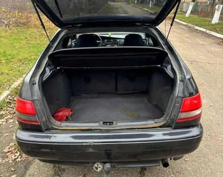 Черный Тойота Карина, объемом двигателя 1.8 л и пробегом 210 тыс. км за 1799 $, фото 9 на Automoto.ua