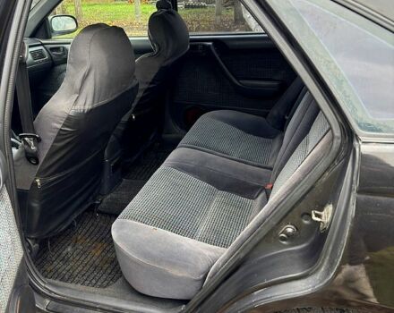 Черный Тойота Карина, объемом двигателя 1.8 л и пробегом 210 тыс. км за 1799 $, фото 8 на Automoto.ua