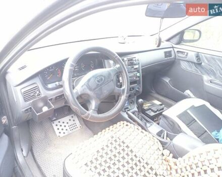 Черный Тойота Карина, объемом двигателя 1.76 л и пробегом 293 тыс. км за 2650 $, фото 1 на Automoto.ua