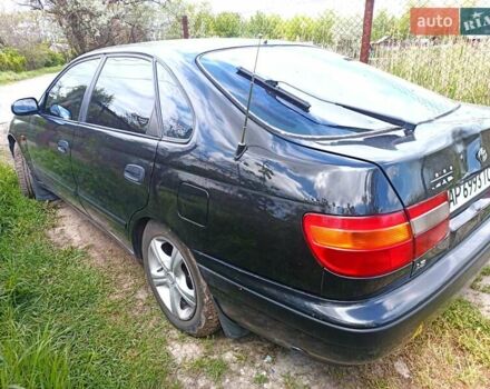 Черный Тойота Карина, объемом двигателя 1.76 л и пробегом 293 тыс. км за 2650 $, фото 5 на Automoto.ua