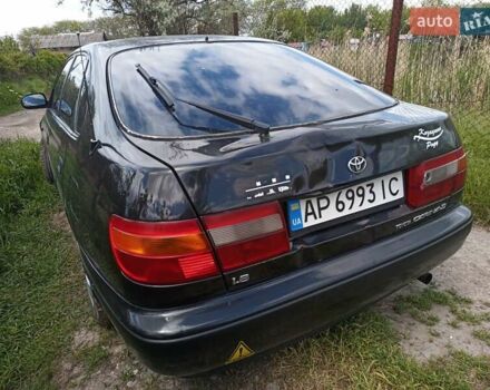 Черный Тойота Карина, объемом двигателя 1.76 л и пробегом 293 тыс. км за 2650 $, фото 3 на Automoto.ua