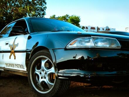 Черный Тойота Карина, объемом двигателя 2 л и пробегом 378 тыс. км за 2500 $, фото 1 на Automoto.ua