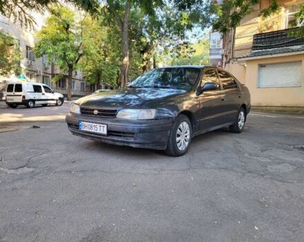 Чорний Тойота Каріна, об'ємом двигуна 1.6 л та пробігом 587 тис. км за 1550 $, фото 1 на Automoto.ua
