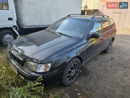 Тойота Каріна 1997 у Миколаєві на Automoto.ua Чорний Тойота Каріна, об'ємом двигуна 1.76 л та пробігом 310 тис. км за 3800 $, фото 1 на Automoto.ua