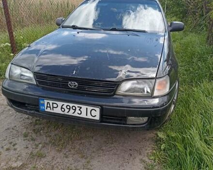 Черный Тойота Карина, объемом двигателя 1.76 л и пробегом 293 тыс. км за 2650 $, фото 1 на Automoto.ua