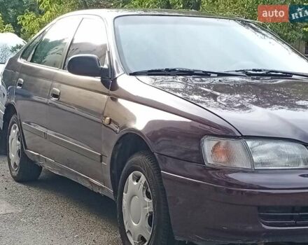 Фиолетовый Тойота Карина, объемом двигателя 1.6 л и пробегом 443 тыс. км за 1800 $, фото 1 на Automoto.ua