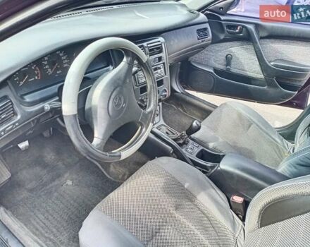 Фиолетовый Тойота Карина, объемом двигателя 1.6 л и пробегом 443 тыс. км за 1800 $, фото 4 на Automoto.ua