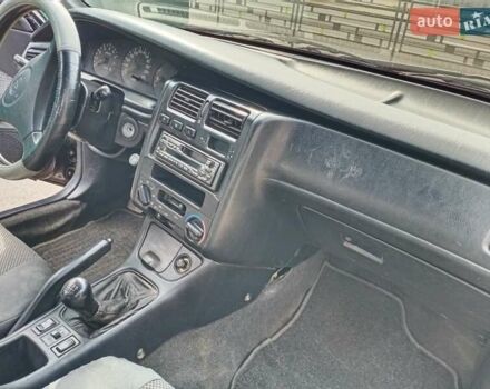 Фиолетовый Тойота Карина, объемом двигателя 1.6 л и пробегом 443 тыс. км за 1800 $, фото 6 на Automoto.ua