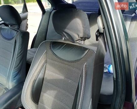 Фиолетовый Тойота Карина, объемом двигателя 1.6 л и пробегом 443 тыс. км за 1800 $, фото 3 на Automoto.ua