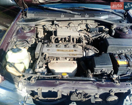 Фиолетовый Тойота Карина, объемом двигателя 1.6 л и пробегом 443 тыс. км за 1800 $, фото 2 на Automoto.ua