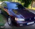 Коричневый Тойота Карина, объемом двигателя 1.6 л и пробегом 395 тыс. км за 3000 $, фото 1 на Automoto.ua