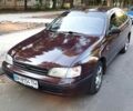 Коричневий Тойота Каріна, об'ємом двигуна 2 л та пробігом 320 тис. км за 2500 $, фото 1 на Automoto.ua