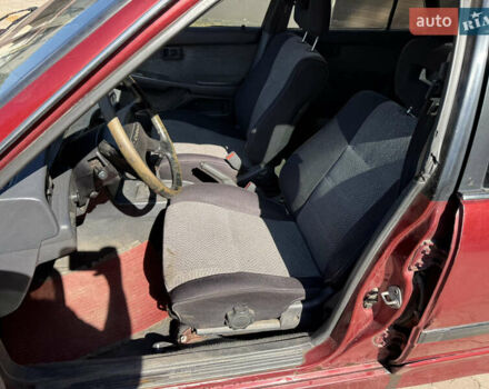 Красный Тойота Карина, объемом двигателя 2 л и пробегом 333 тыс. км за 1375 $, фото 8 на Automoto.ua