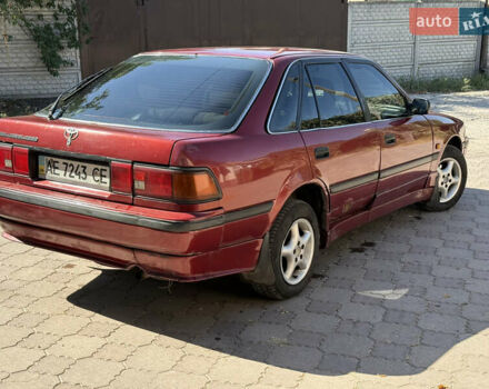 Красный Тойота Карина, объемом двигателя 2 л и пробегом 333 тыс. км за 1375 $, фото 3 на Automoto.ua