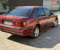 Красный Тойота Карина, объемом двигателя 2 л и пробегом 333 тыс. км за 1375 $, фото 3 на Automoto.ua