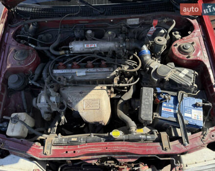 Красный Тойота Карина, объемом двигателя 2 л и пробегом 333 тыс. км за 1375 $, фото 6 на Automoto.ua