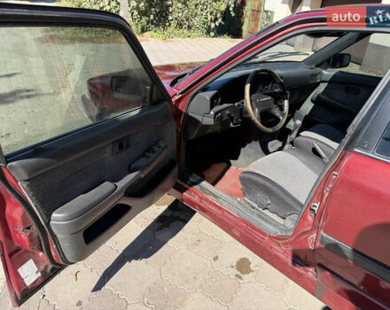 Красный Тойота Карина, объемом двигателя 2 л и пробегом 333 тыс. км за 1375 $, фото 7 на Automoto.ua