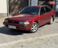 Красный Тойота Карина, объемом двигателя 2 л и пробегом 333 тыс. км за 1375 $, фото 1 на Automoto.ua