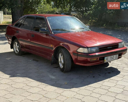 Красный Тойота Карина, объемом двигателя 2 л и пробегом 333 тыс. км за 1375 $, фото 2 на Automoto.ua