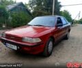 Красный Тойота Карина, объемом двигателя 1.6 л и пробегом 300 тыс. км за 1150 $, фото 1 на Automoto.ua