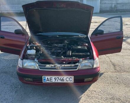 Красный Тойота Карина, объемом двигателя 2 л и пробегом 320 тыс. км за 3500 $, фото 5 на Automoto.ua