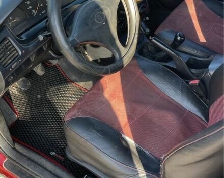 Красный Тойота Карина, объемом двигателя 2 л и пробегом 380 тыс. км за 2500 $, фото 9 на Automoto.ua