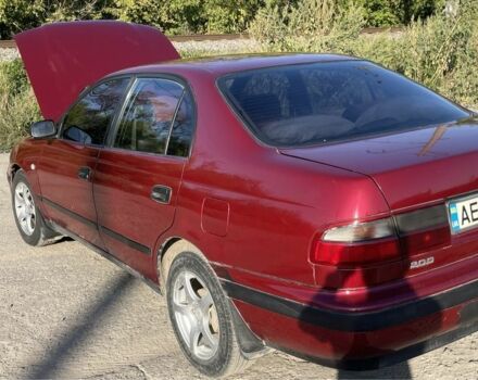 Красный Тойота Карина, объемом двигателя 2 л и пробегом 380 тыс. км за 2500 $, фото 14 на Automoto.ua