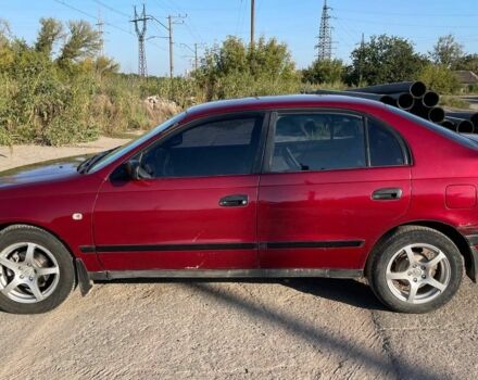 Красный Тойота Карина, объемом двигателя 2 л и пробегом 320 тыс. км за 3500 $, фото 19 на Automoto.ua