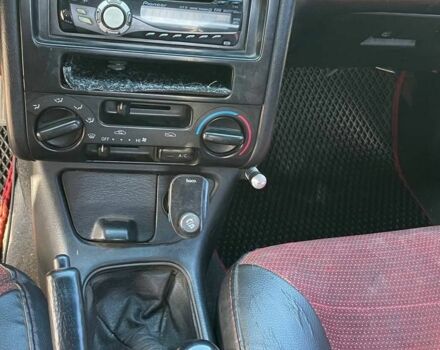 Красный Тойота Карина, объемом двигателя 2 л и пробегом 320 тыс. км за 3500 $, фото 12 на Automoto.ua