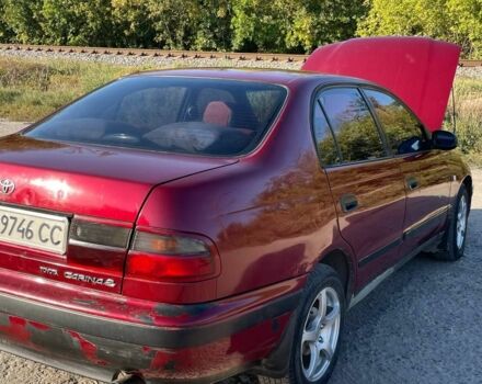 Красный Тойота Карина, объемом двигателя 2 л и пробегом 320 тыс. км за 3500 $, фото 3 на Automoto.ua