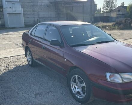 Красный Тойота Карина, объемом двигателя 2 л и пробегом 380 тыс. км за 2500 $, фото 4 на Automoto.ua