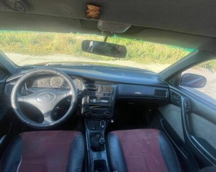 Красный Тойота Карина, объемом двигателя 2 л и пробегом 320 тыс. км за 3500 $, фото 7 на Automoto.ua