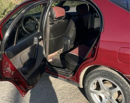 Красный Тойота Карина, объемом двигателя 2 л и пробегом 380 тыс. км за 2500 $, фото 7 на Automoto.ua