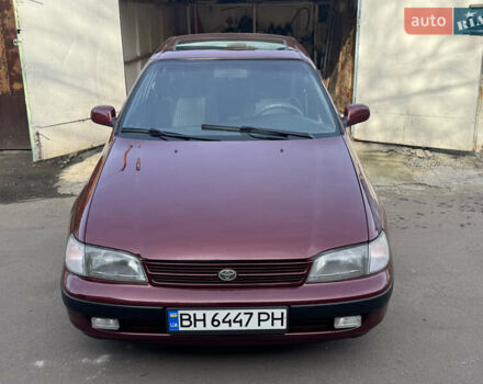 Красный Тойота Карина, объемом двигателя 1.6 л и пробегом 259 тыс. км за 2800 $, фото 1 на Automoto.ua